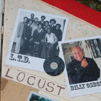 Mural detail showing photos of soul group L.T.D. and Billy Osborne on the Locust Street section of the music mural.